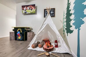 Play area in upstairs twin bunk room
