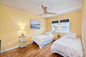 Two twin beds with comfortable bedding