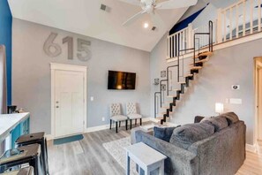 living room with loft bed