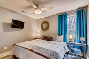 king bed in main level bedroom