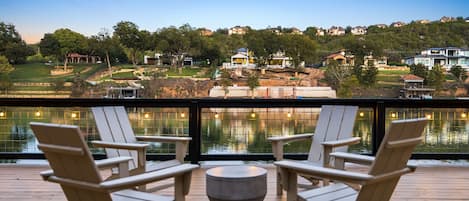 Our top deck where four seats meet stunning views of Lake Austin.