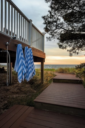 Clean off extra sand from the beach with the outdoor shower!