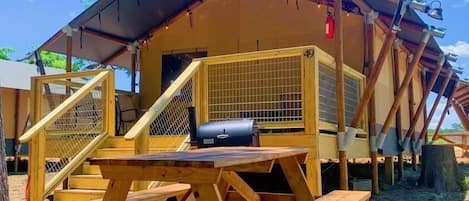 Each Safari Cabin has it's own picnic table, BBQ pit fire pit & hammock