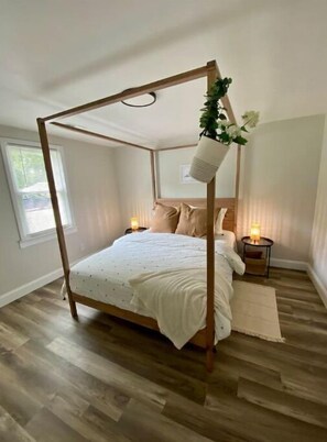 Queen bed, large closet, dresser drawers, bedside tables and lamps 