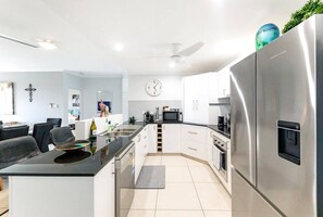 The well-equipped kitchen has all you need to cook up a feast at home.