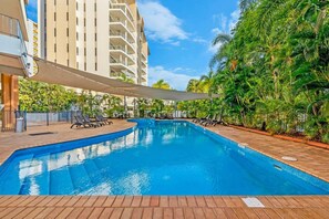 Soak up the sun in the tree-lined pool downstairs.