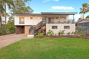 This pet-friendly stay features a large, well-maintained front lawn that offers plenty of space to relax and play with your furry friend.