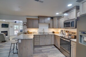 Kitchen | Indoor Fireplace | Central Air Conditioning