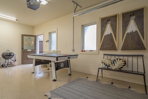 Play endless rounds of ping pong (or air hockey) in the garage.