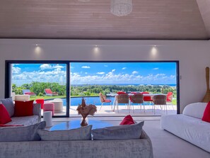 Elegant Lounge: Sea & Pool View