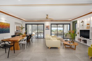 Bright and Artistic Living Room with Terrace View