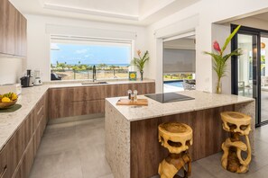 Contemporary Kitchen with Pool View