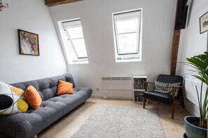 Spacious sofa to stretch out on and relax. 