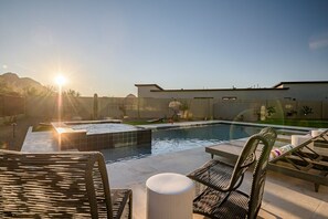 “Golden hour by the pool, where the day’s end meets serene beginnings. 🌅✨ #SunsetSerenity #PoolsidePeace”