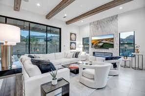 “Chill vibes in a cozy living room, where modern design meets comfort. 🛋️✨ #HomeSweetHome #LivingRoomGoals”