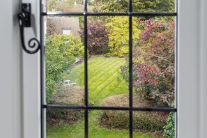 Wake up to birdsong and a beautiful garden view