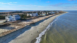 The property is the light-blue & white house on the left.
Photo: Driscoll Drones