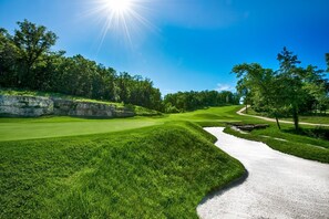 Embrace the Challenge: Navigate the scenic bunkers on our stunning golf course.