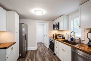 The kitchen is stocked with everything you'll need to cook meals.