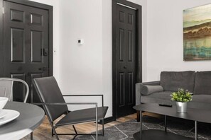 Step into our living room, where every moment feels like a warm embrace. Perfect for long-term stays, it's where you find solace, joy, and endless relaxation. Welcome to your new haven.  #LongTermRetreat