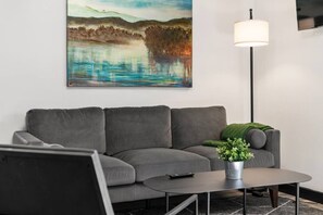 Discover the art of comfortable living in our cozy living room. Ideal for long-term stays, it's more than just a space; it's a lifestyle. Welcome to your perfect retreat. #LongTermLiving