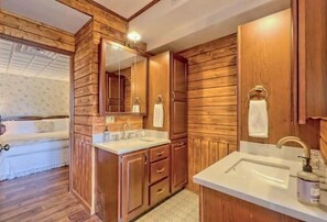 Master bathroom downstairs, double vanity.