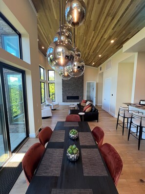 Dining room view with open floor plan. 