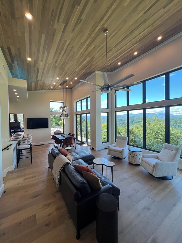 Living room & dining room with scenic views.