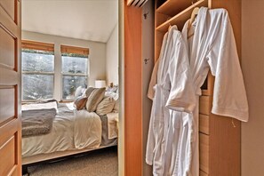 Master bedroom with luxurious robes for your enjoyment