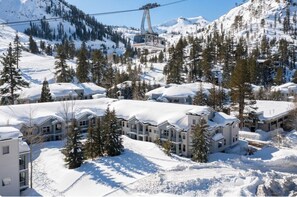 Located in the original Squaw Valley Lodge, steps from Funitel, Tram, Palisades Village and KT22.