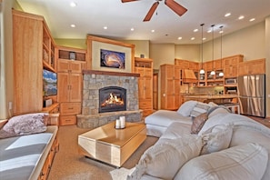 Another view of comfortable living area with beautiful gas fireplace!