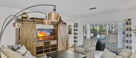 One of the two cozy living areas. Spacious with amazing Pool Views!