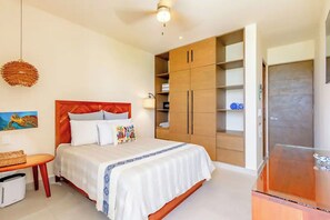 Experience ultimate comfort with our secure safe, plush towels, AC, and Smart TV.