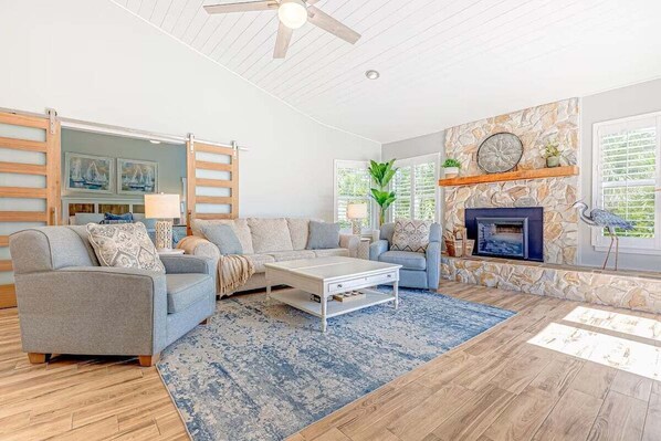 Spacious, newly remodeled living room with modern touches.