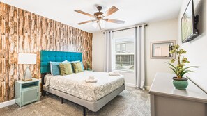Luxurious queen bedroom, blending elegance and comfort for a serene and indulgent sleeping space