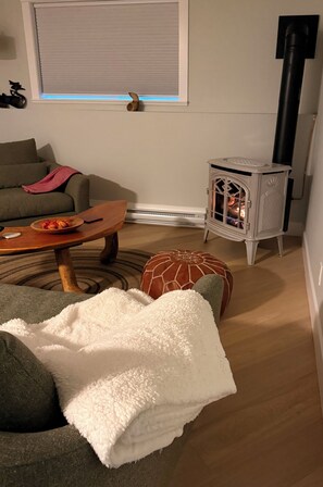 Unwind and hang out in the comfortable living room with local art.