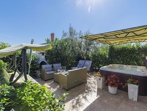 Plant, Sky, Flowerpot, Shade, Table, Outdoor Furniture, Building, Outdoor Table, Chair, Urban Design