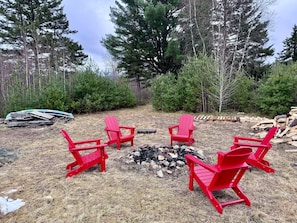 Roasting marshmallows by the fire pit - this home is designed for comfort and fun.