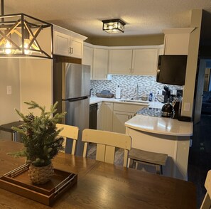 Dining table and kitchen