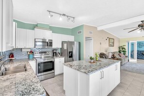 Set up a buffet style dinner around the kitchen island!
