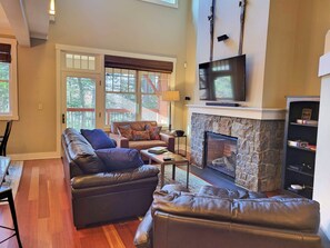 Living area with gas fireplace and TV