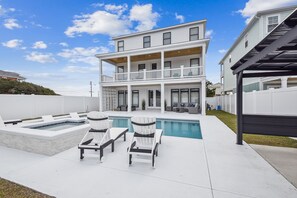 Relax on a lounge chair while the kids frolic in the pool.