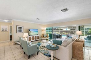 The great room opens to the lanai, dining area and kitchen 