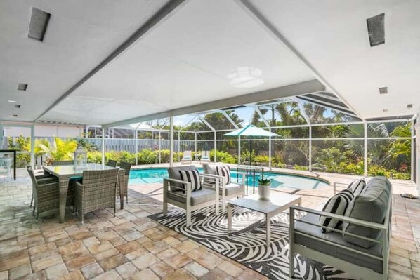 Relax and enjoy the sunshine on the lanai