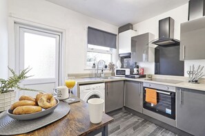 Start your day in our fully equipped, modern kitchen.