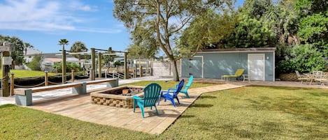 Enjoy days and nights in the fenced backyard. 