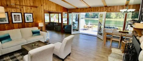 Beautiful main living room. Fireplace, TV and sweeping views of the water!