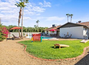 Bask in the beautiful weather out on the lawn while enjoying fun games.