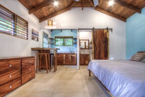 Kitchen and Bathroom view.  Fully stocked kitchenette with a gas cooktop.