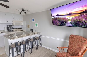 Kick back and relax in the living room in front of the smart TV!